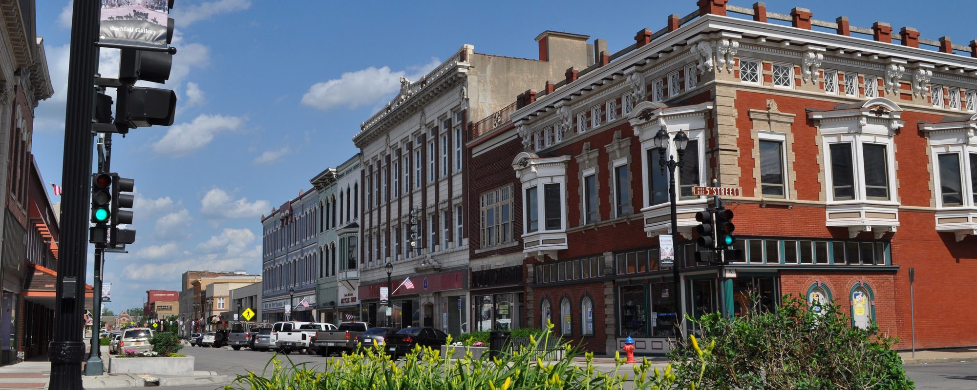 Historic brick storefronts along Delaware Street in downtown Leavenworth, Kansas